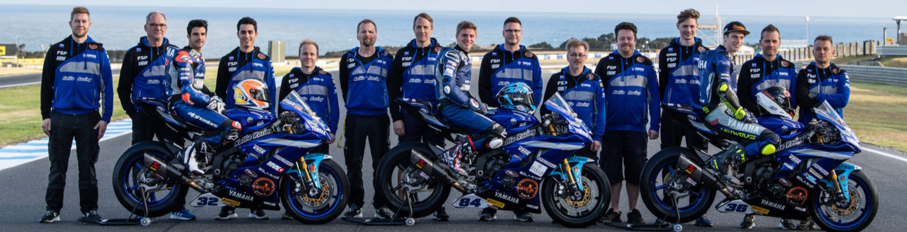Kallio Racing team Leijona työvaatteet